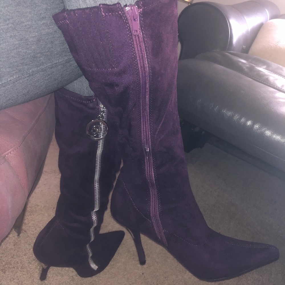 Delicious knee high boots in deep purple suede.
